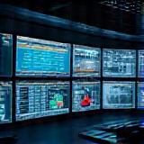 Monitoring station screens showing real-time data
