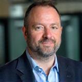 Professional headshot of Benoit Laurent