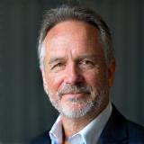 Professional headshot of Pierre Dupont